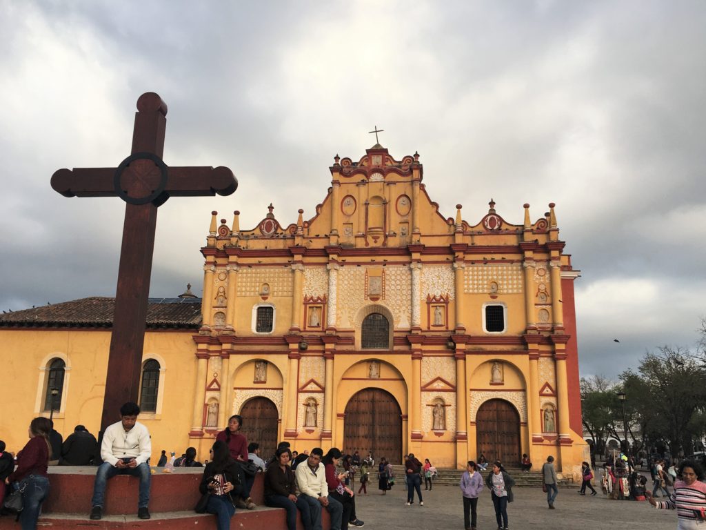 cathedral with wooden cross in front